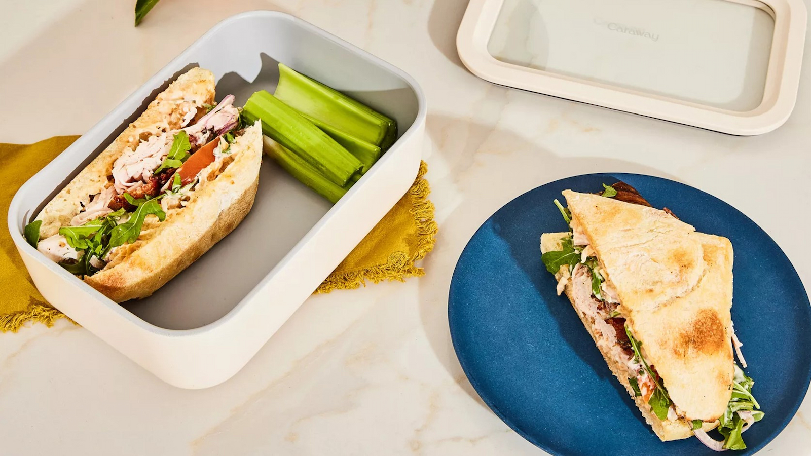A sandwich in a food storage container