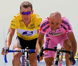 Marco Pantani sprints to the line first ahead of Lance Armstrong at the summit of Mount Ventoux during the 2000 Tour de France