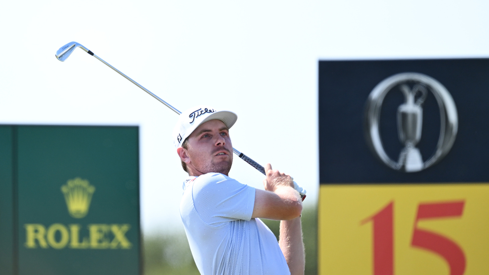 Ryan Gerard hits a tee shot with an iron