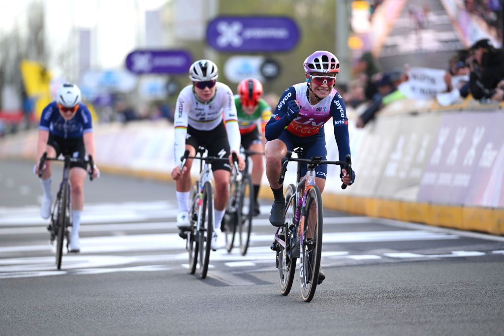 WAREGEM BELGIUM MARCH 27 Letizia Paternoster of Italy and Team LivAlUla Jayco on third place reacts crossing the finish line during the 12nd Dwars door Vlaanderen 2024 Womens Elite a 1299km one day race from Waregem to Waregem on March 27 2024 in Waregem Belgium Photo by Tim de WaeleGetty Images