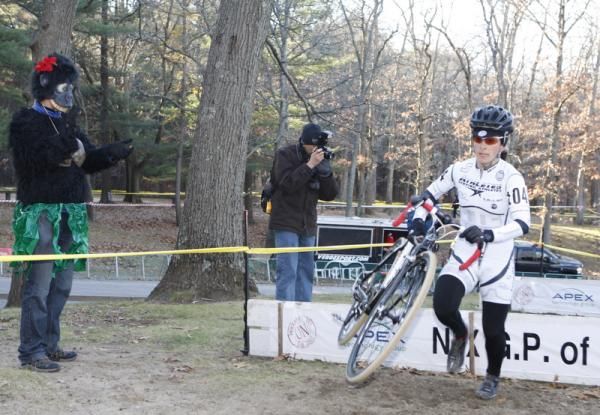 Arley Kemmerer (C3/Athletes Serving Athletes) through the barriers.
