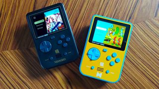 Neo Geo and Data East Super Pocket handhelds on woodgrain table.