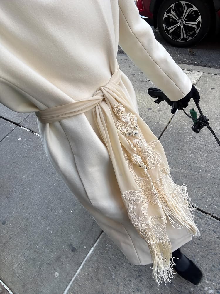 An image of @christietyler wearing a silk scarf.