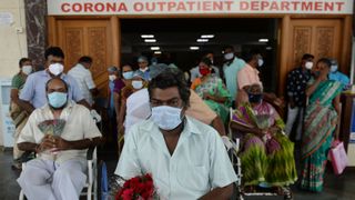 recovered patients from the covid 19 coronavirus after 100 days of treatment prepare to go home at a government hospital in chennai on december 31, 2020 photo by arun sankar afp photo by arun sankarafp via getty images