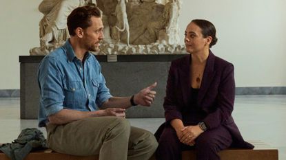 Tom Hiddleston talks to Dr. Sarita Robinson in a museum