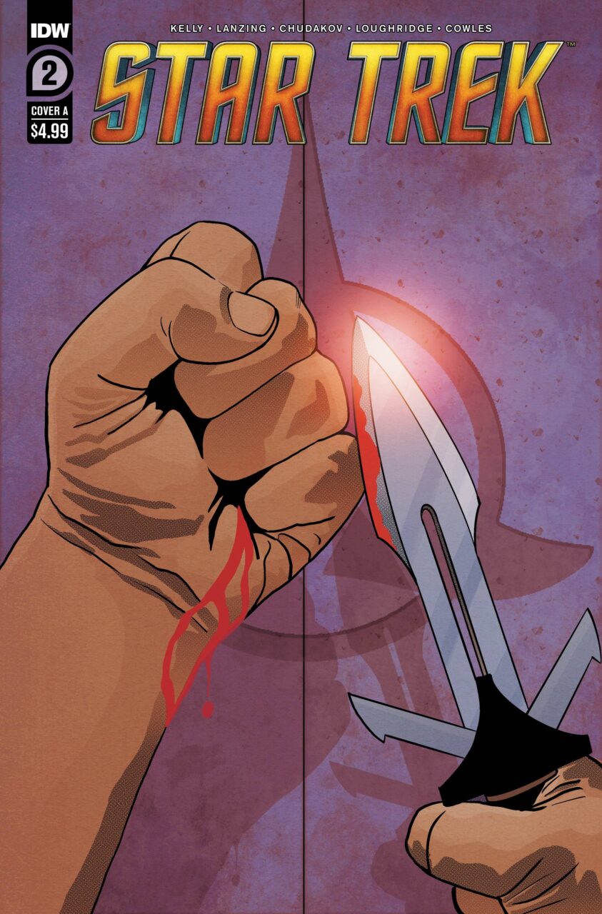 Star Trek issue 2 cover art showing a human hand and Klingon knife
