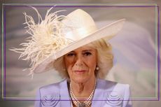 a close up of Queen Consort Camilla in a wedding hat