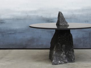 Stone furniture by Pott against handpainted gradient