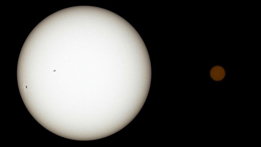 A large white star with a smaller orange star