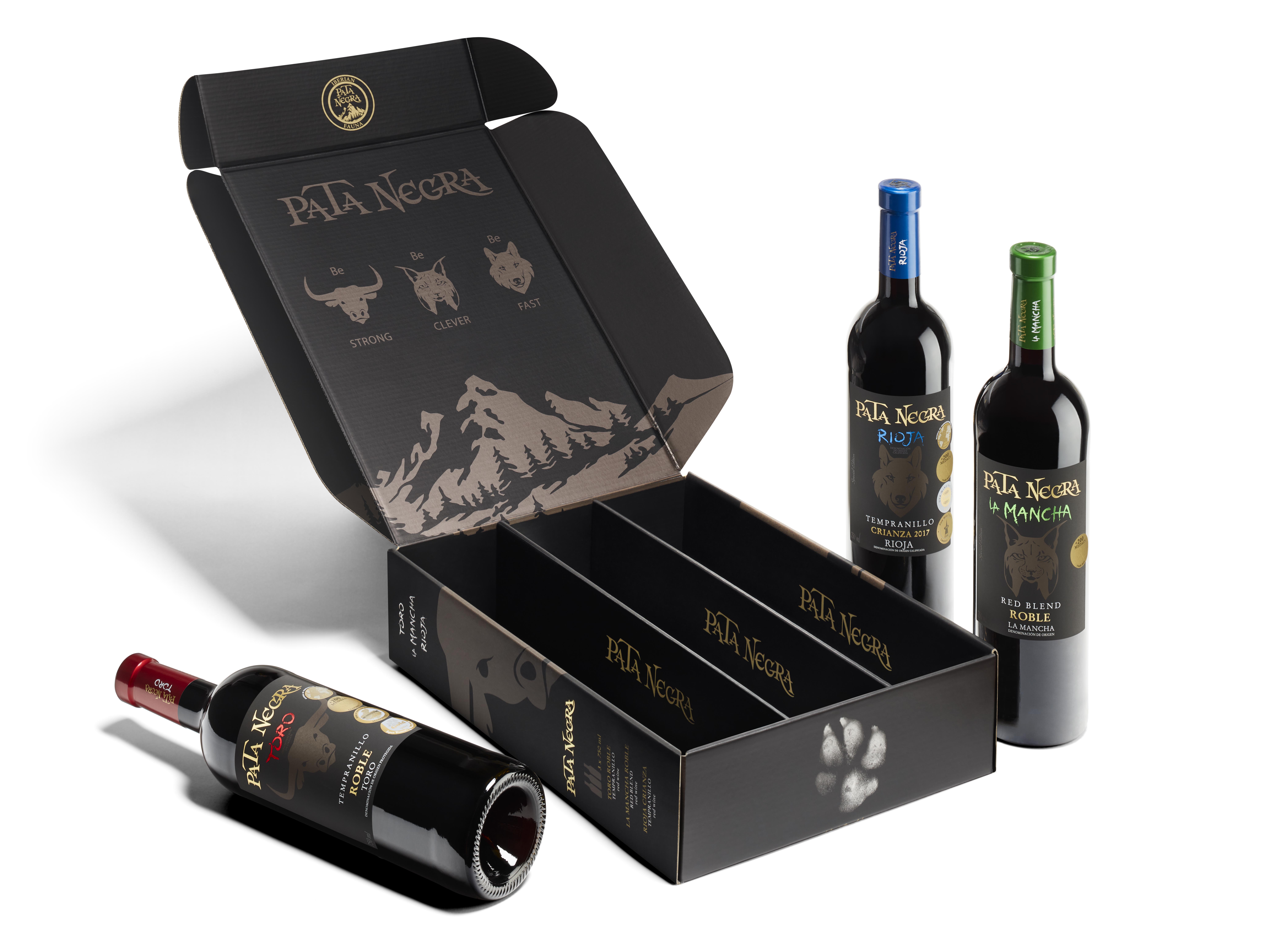 A black gift box with three of Pata Negra's red wines next to it