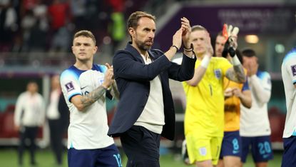 Gareth Southgate and the England players clap the fans after the win over Iran 