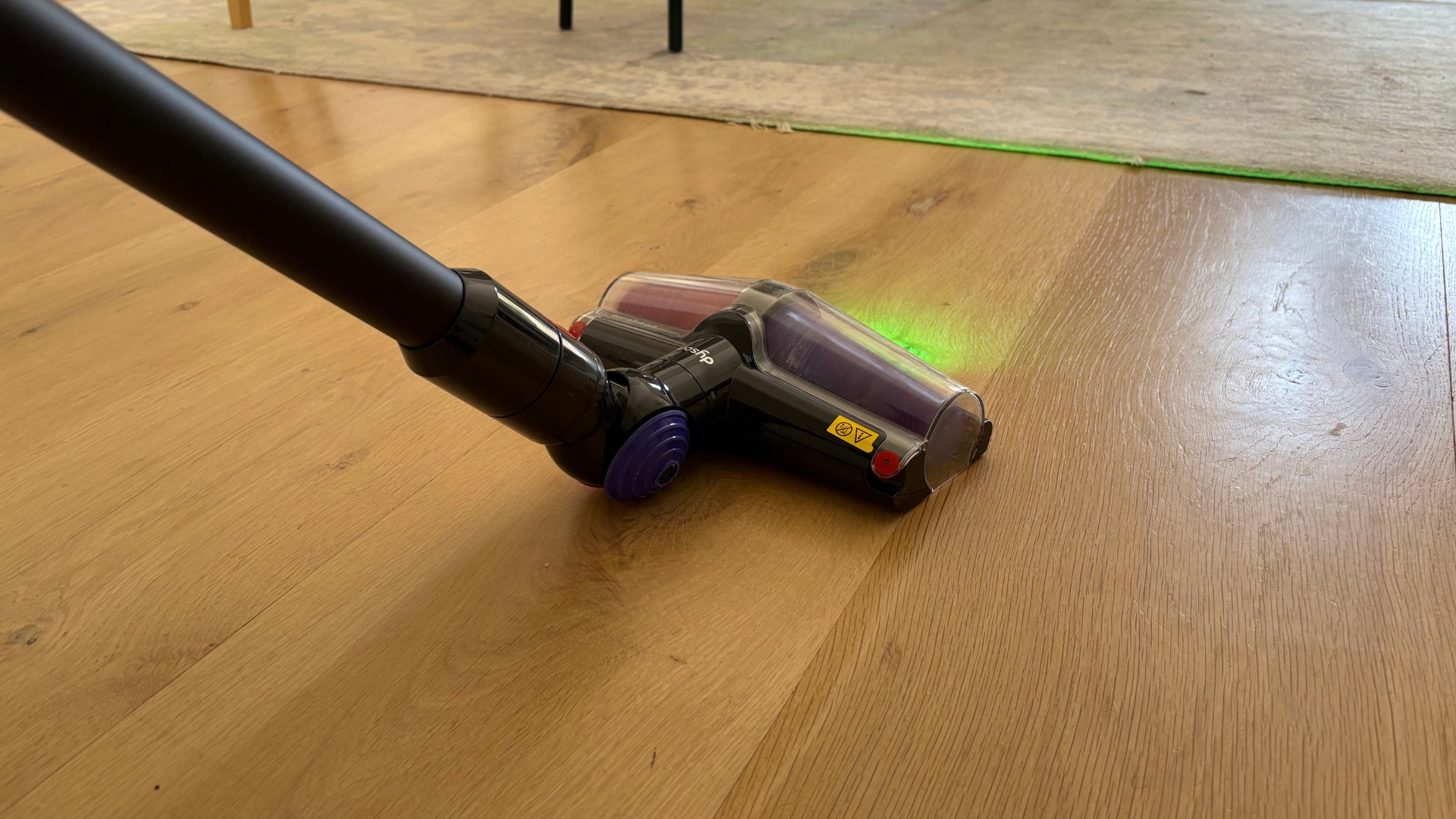 Testing the Dyson V10 Konical Cordless Vacuum showing it vacuuming the floor