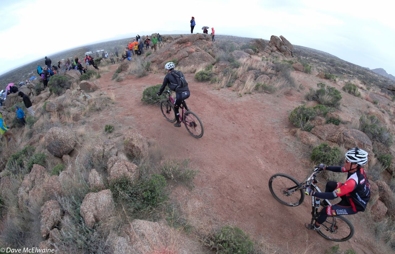 Racers weave their way through the boulder littered course