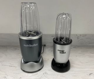 The Magic Bullet Kitchen Express next to the Nutribullet Pro 600 on the counter