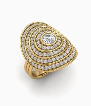 Almasika Ring is a gold band with a large hero on top featuring diamond stones and inside circles leading to the central stone.