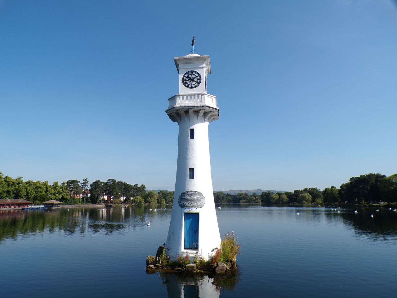 A lighthouse surrounded by water