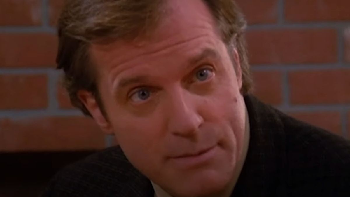 Stephen Collins sits in discussion in 7th Heaven.