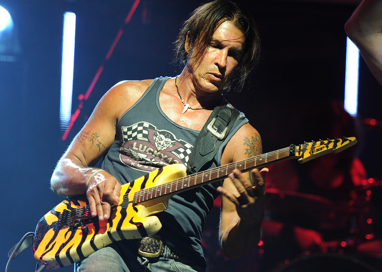 George Lynch performs onstage with Lynch Mob at The Culture Room in Fort Lauderdale, Florida on August 6, 2011