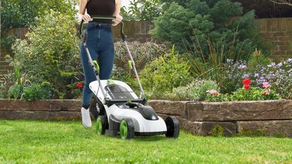 mowing a lawn with Gtech CLM50 cordless lawn mower