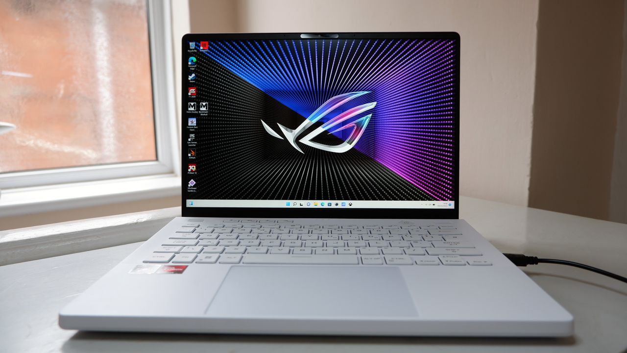 Asus ROG Zephyrus G14 gaming laptop from the front on a window ledge.