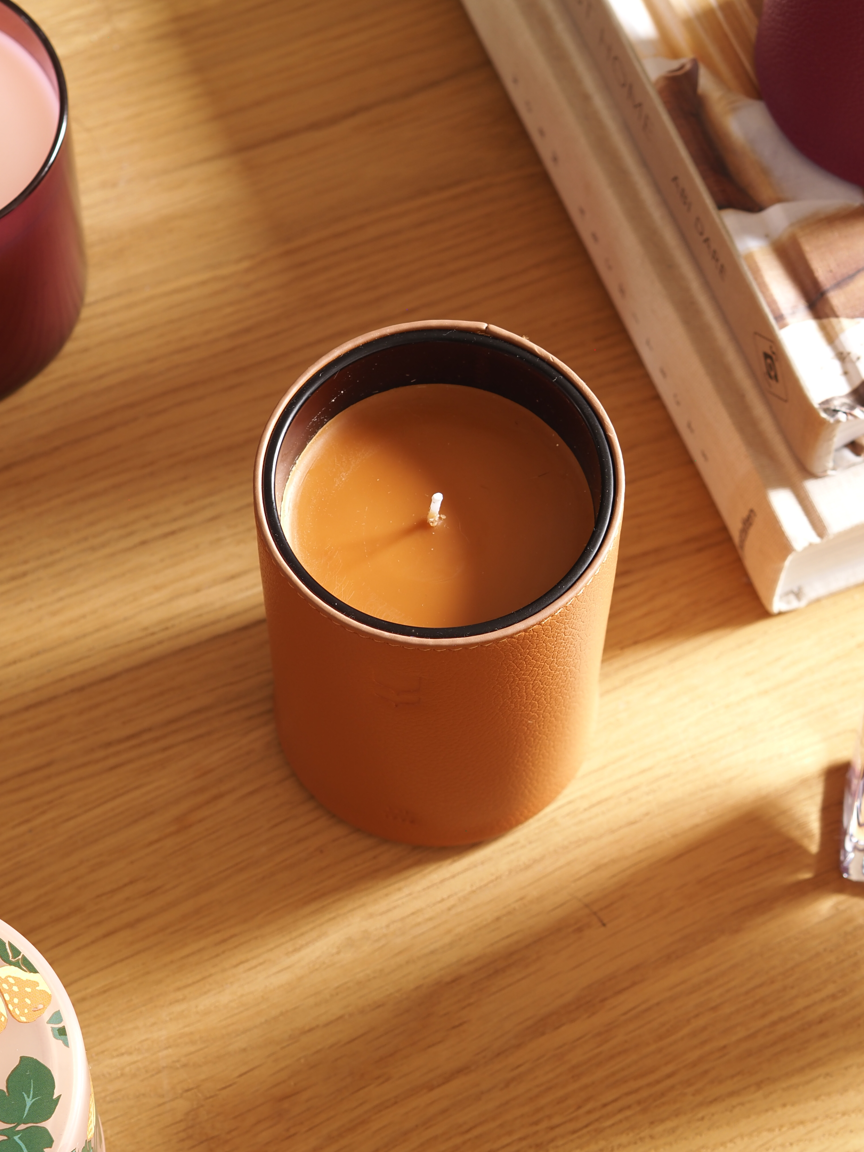 a tan leather candle