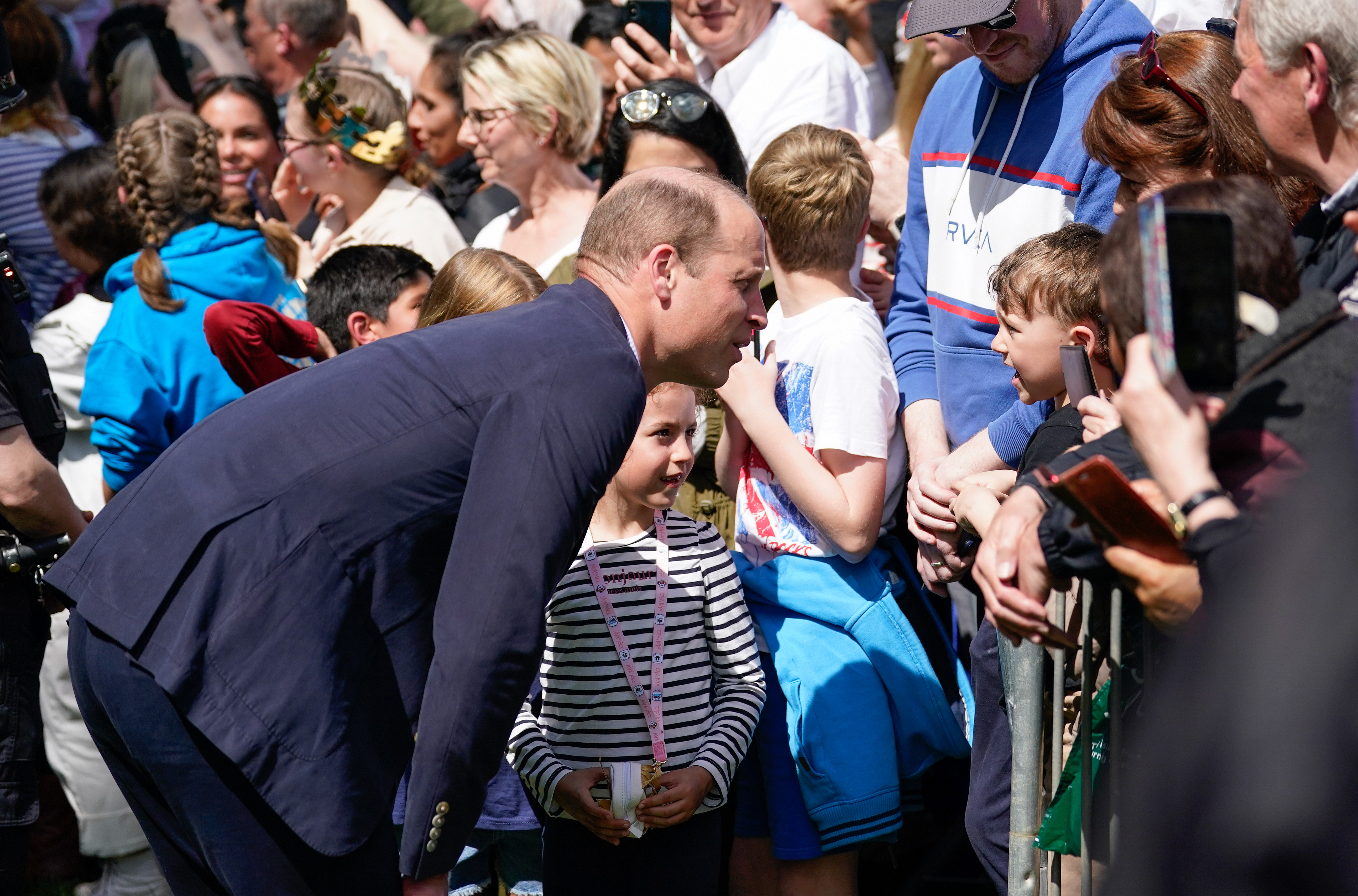 Prince William meets a young fan who asks him whether Prince William is coming to meet them anytime soon