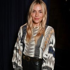 Sienna Miller wears a boho jumper.