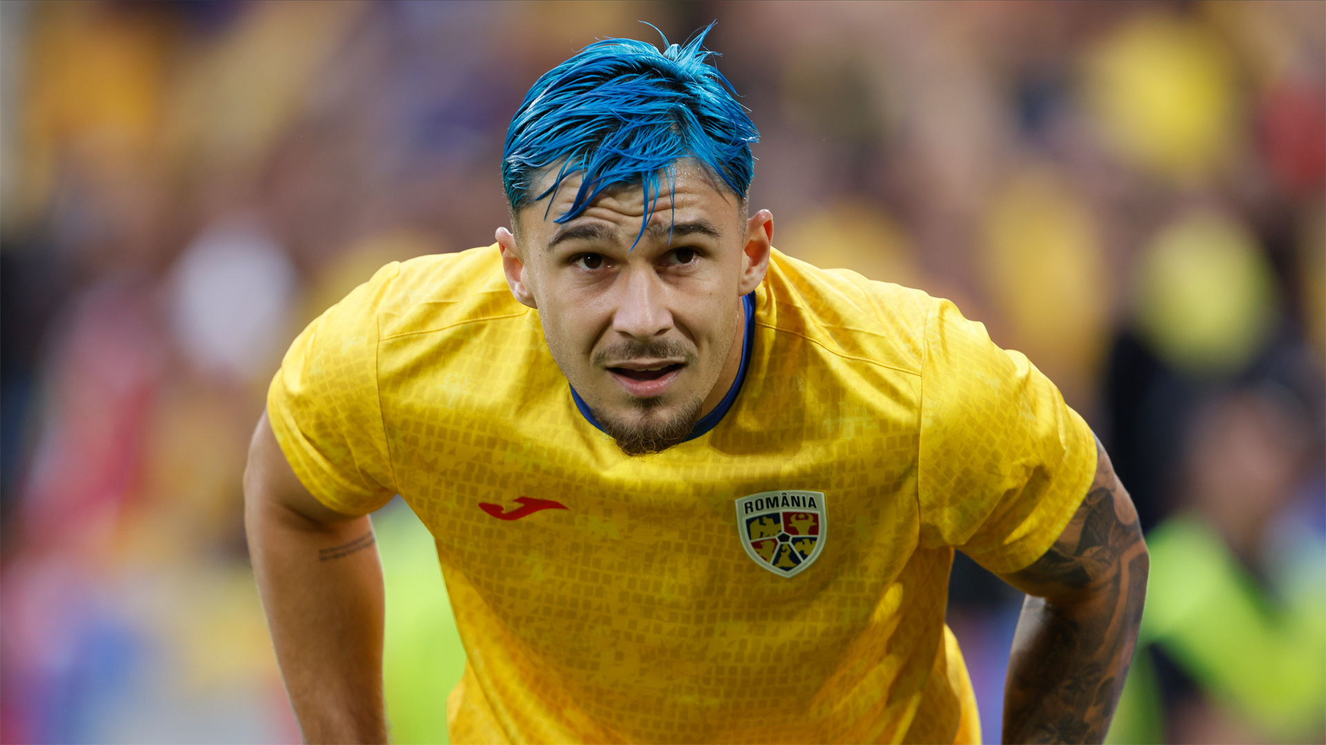 Slovakia vs Romania Andrei Ratiu warming up before his side's match against Belgium at Euro 2024.