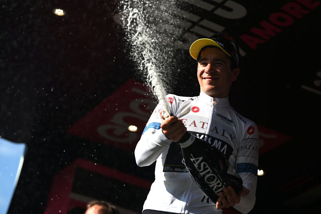 LUCCA ITALY MAY 08 Cian Uijtdebroeks of Belgium and Team Visma Lease a Bike White Best Young Jersey celebrates at podium during the 107th Giro dItalia 2024 Stage 5 a 178km stage from Genova to Lucca UCIWT on May 08 2024 in Lucca Italy Photo by Dario BelingheriGetty Images