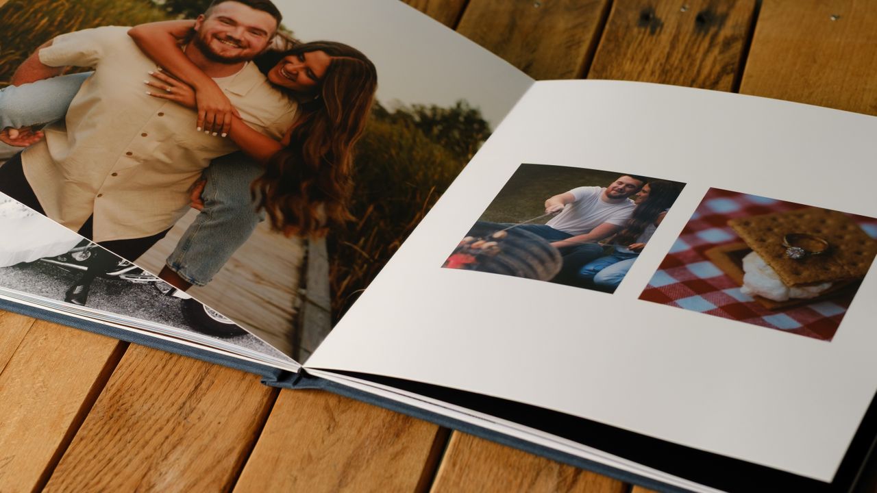 Photo books from Printique on a desktop
