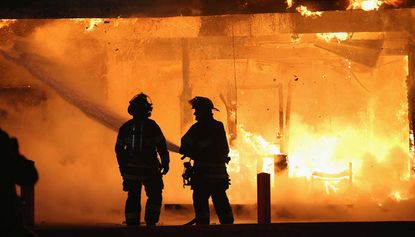 11 bodies have been pulled from a burning funeral home in the US