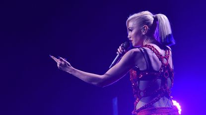 Gwen Stefani singing on stage