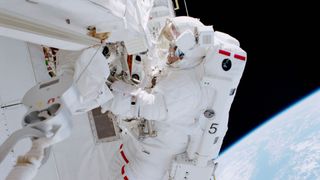 Astronaut Andrew S. W. Thomas on a spacewalk.