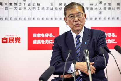 Japan&#039;s Prime Minister Shigeru Ishiba speaks to the media at the Liberal Democratic Party (LDP) headquarters in Tokyo on October 27, 2024