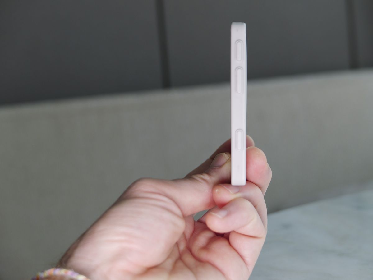 The Vivo selfie screen in user's hand, turned to its side to show how thin it is