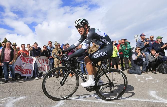 Rigoberto Uran (Omega Pharma-QuickSteps) fights his way up the Monte Grappa to save his overall position