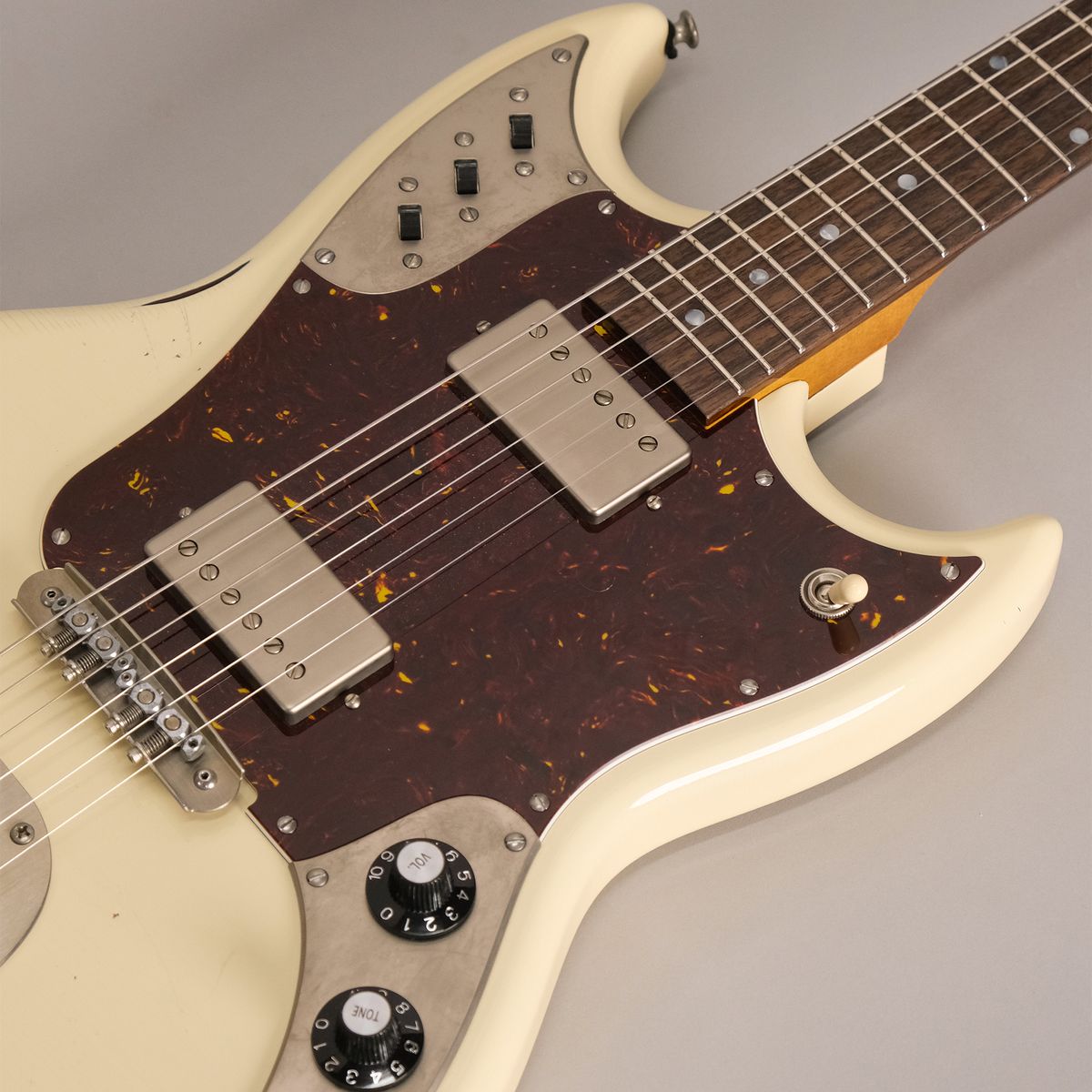 A photo of a Frank Brothers Sonar electric guitar