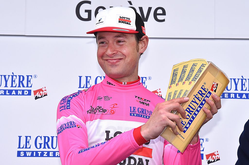 Sander Arm&eacute;e celebrates winning the KOM jersey and some delicious cheese