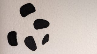 The Panda logo on the Panda Memory Foam Bamboo Pillow