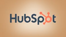 HubSpot logo on beige background