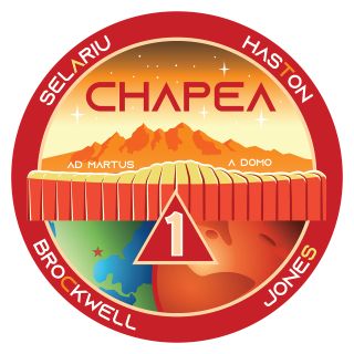 mission patch for NASA's Crew Health and Performance Exploration Analog Mission 1, showing illustrations of both earth and mars.