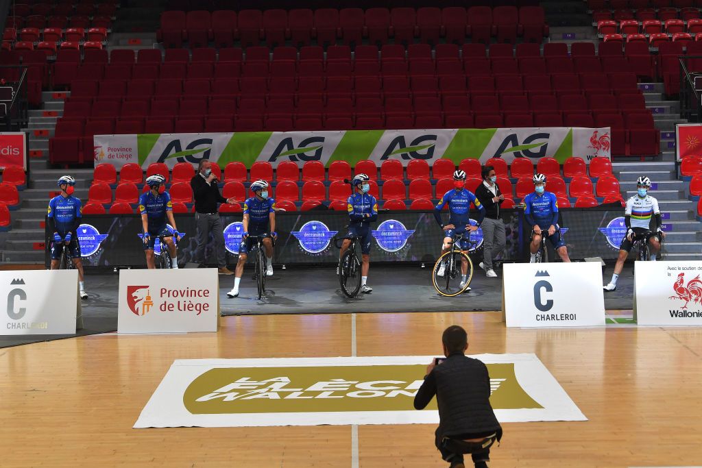 MUR DE HUY BELGIUM APRIL 21 Julian Alaphilippe of France Mattia Cattaneo of Italy Josef Cerny of Czech Republic Dries Devenyns of Belgium Mikkel Honore of Denmark James Knox of United Kingdom Mauri Vansevenant of Belgium and Team Deceuninck QuickStep at start in Spirou Basket Charleroi Clubs court in Charleroi City during the 85th La Fleche Wallonne 2021 Men Elite a 1936km race from Charleroi to Mur de Huy 204m FlecheWallonne on April 21 2021 in Mur de Huy Belgium Photo by Luc ClaessenGetty Images