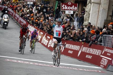 Philippe Gilbert (Omega Pharma-Lotto) takes the win in Siena.