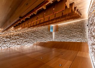Indoor wooden walled auditorium