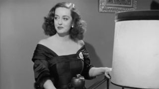 Bette Davis on stairwell delivering 'It's gonna be a bumpy night' line in All About Eve.