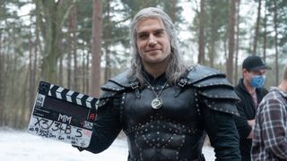 Henry Cavill behind the scenes of The Witcher, one of the best Netflix shows in our list.