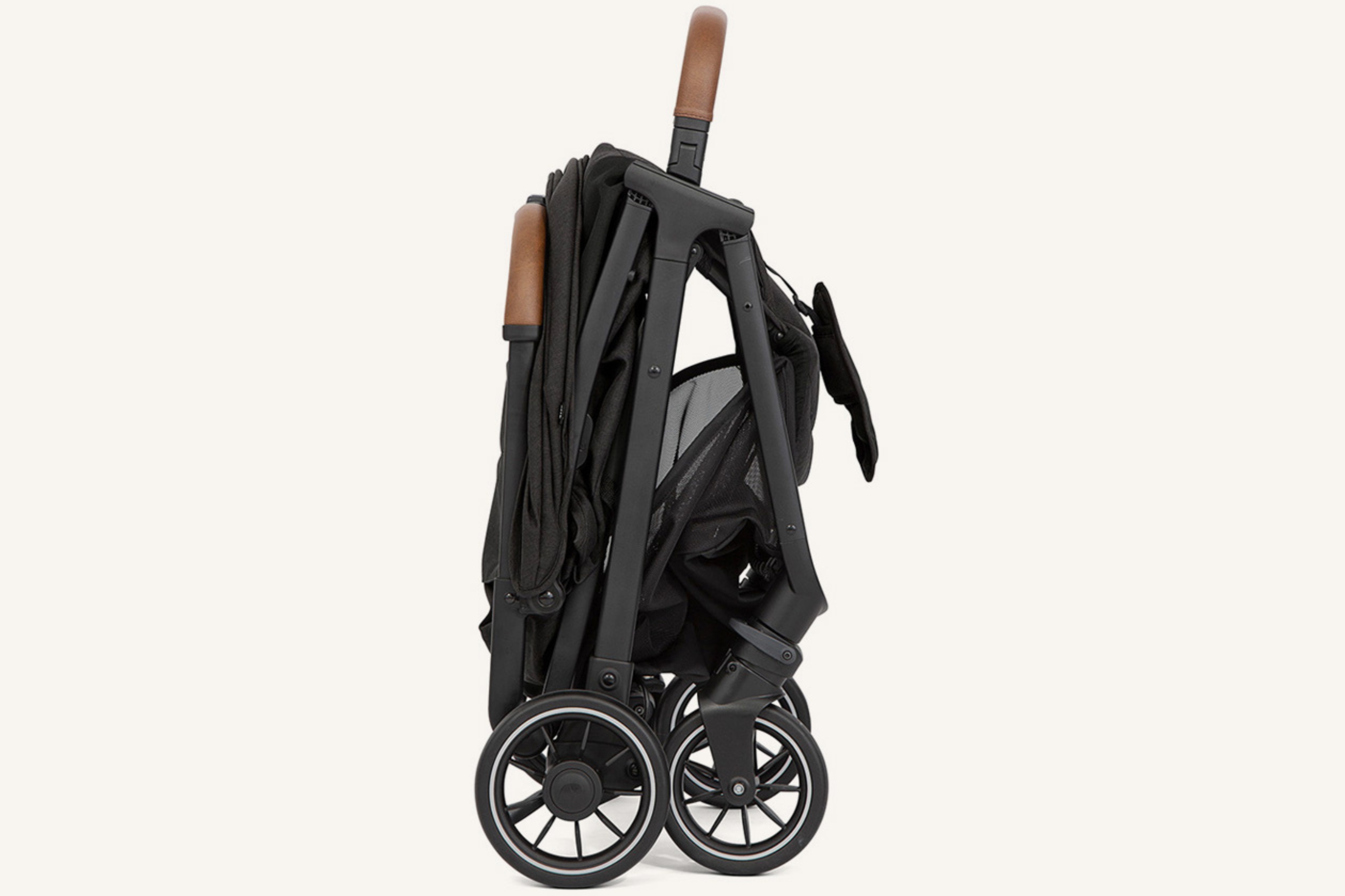 The Joie Pact Pro lightweight compact pushchair shown folded
