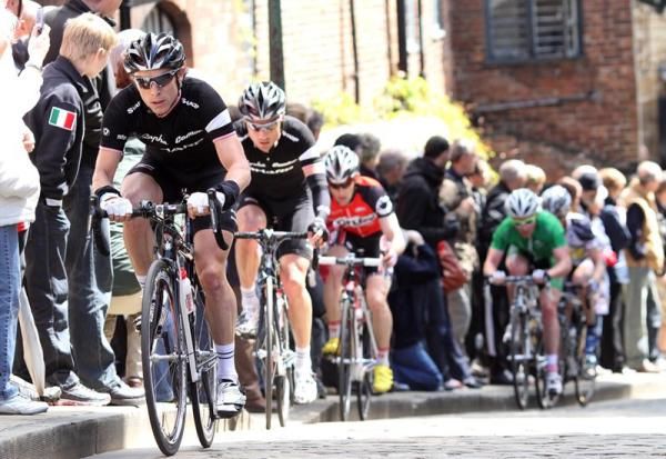 Former race winner Dean Downing (Rapha Condor Sharp) leads Chris Newton and the break up the climb.
