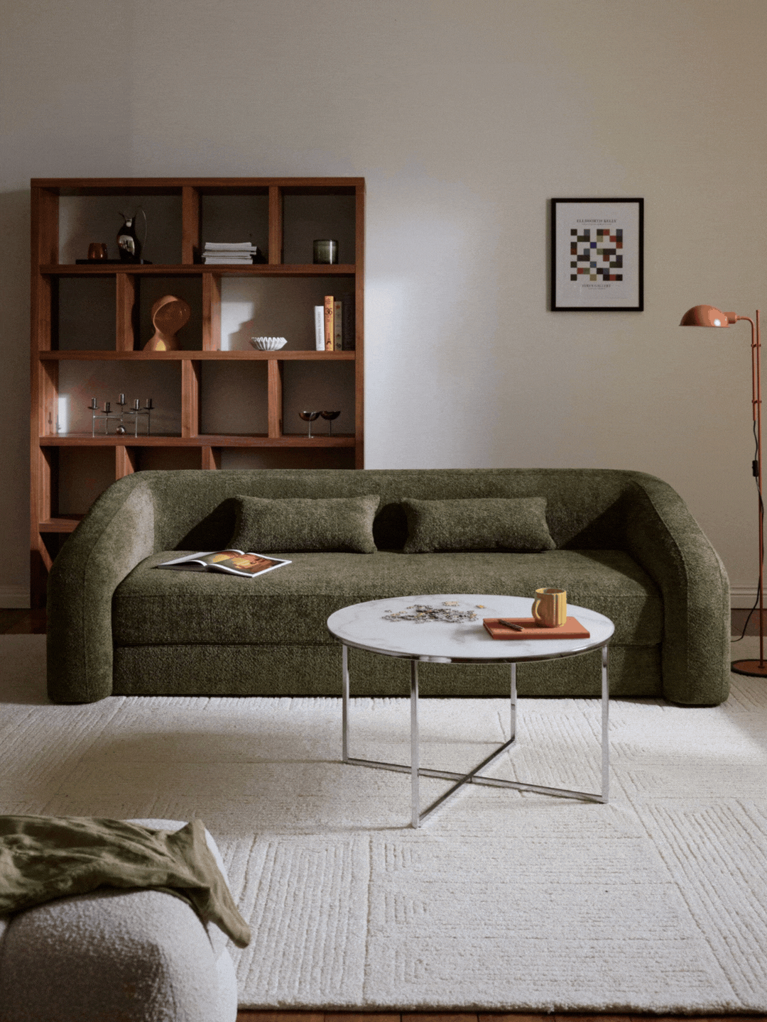 A dark green boucl&amp;eacute; sofa bed from Westwing