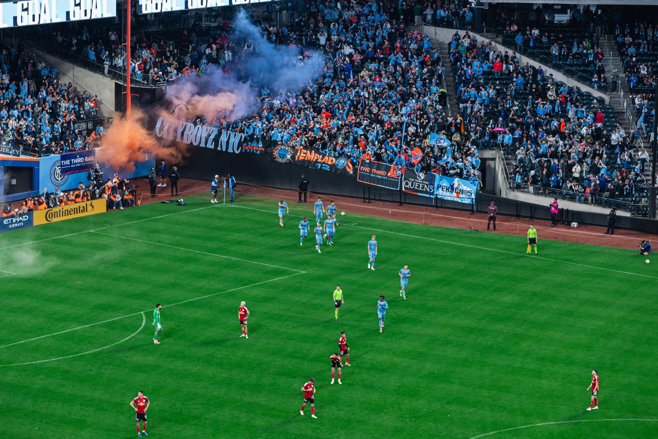 An aerial shot of the players returning to their positions after the first goal